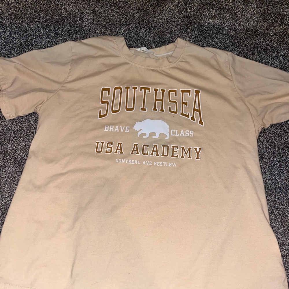 beige graphic tee
